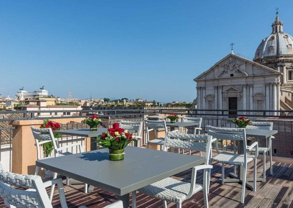 Hotel rooftop terrace with a view of Rome