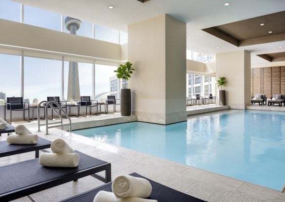 Indoor hotel pool with CN Tower view